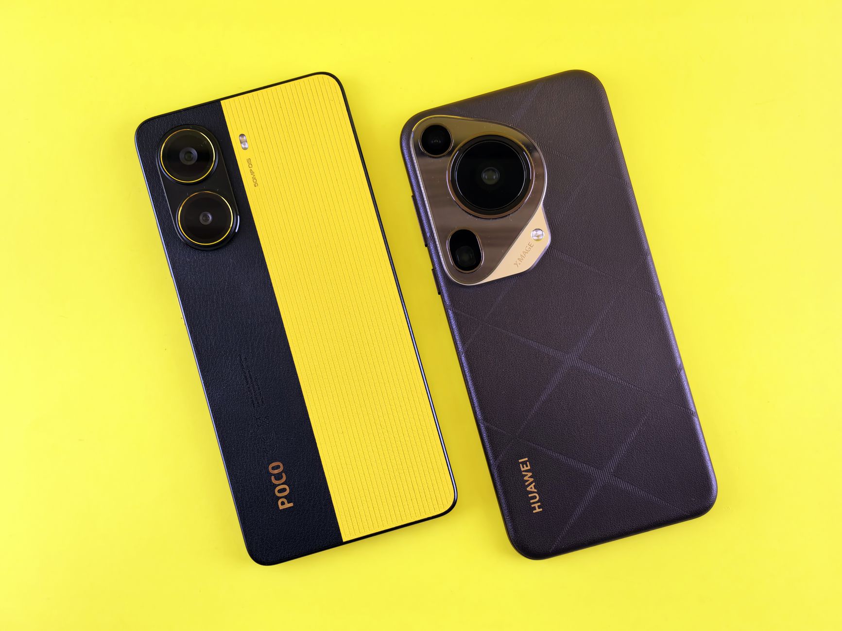 Two modern smartphones showcased on a bright yellow surface, emphasizing design and technology.