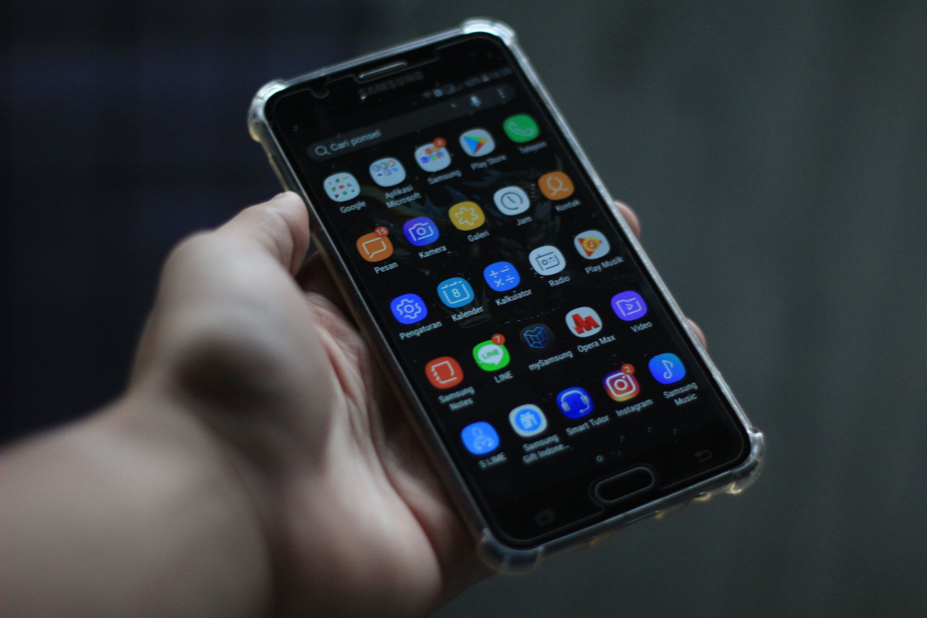 Close-up of a smartphone showcasing various mobile applications on its display.
