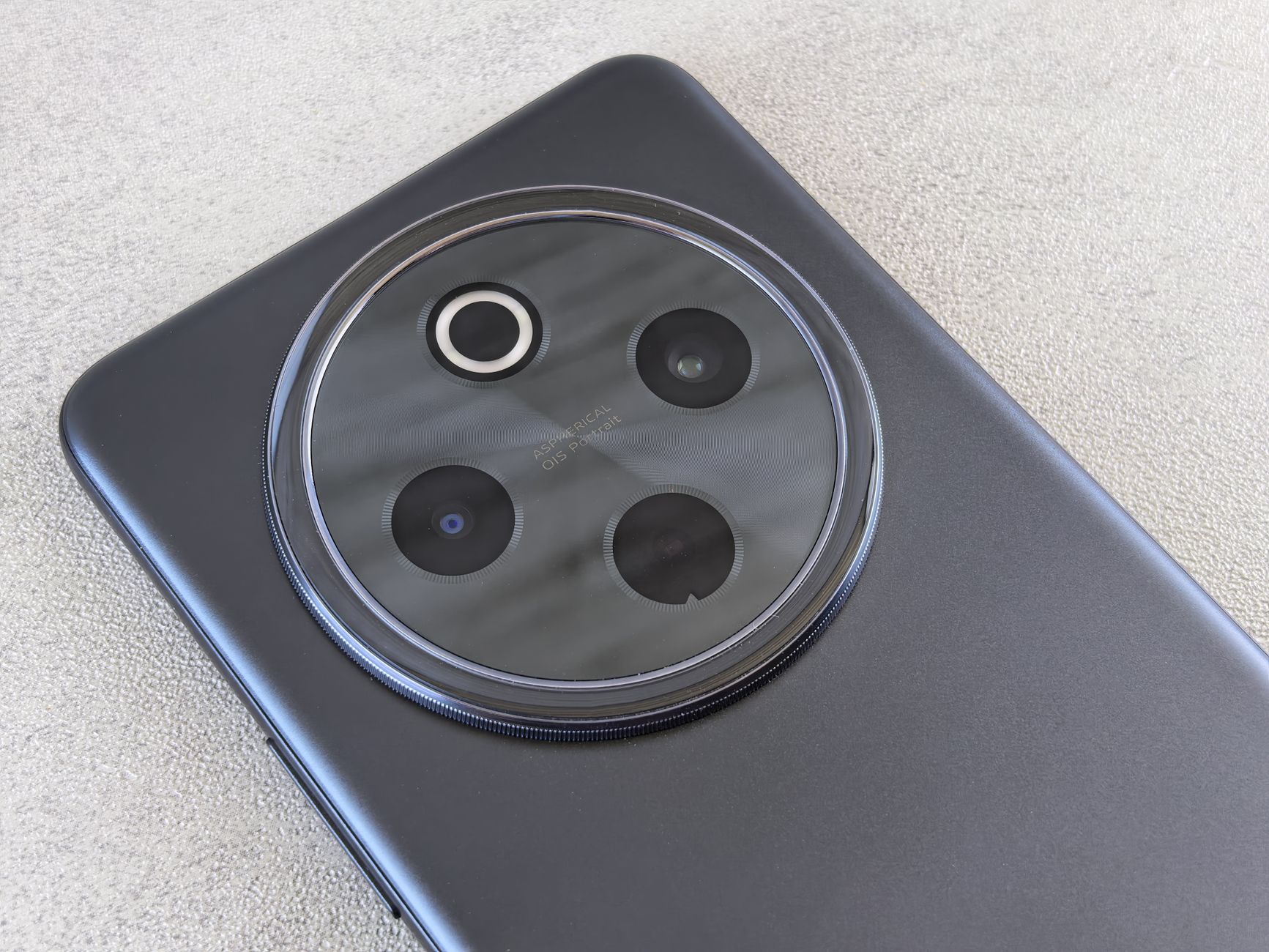 Detailed close-up shot of a smartphone's camera lens module with a modern design.