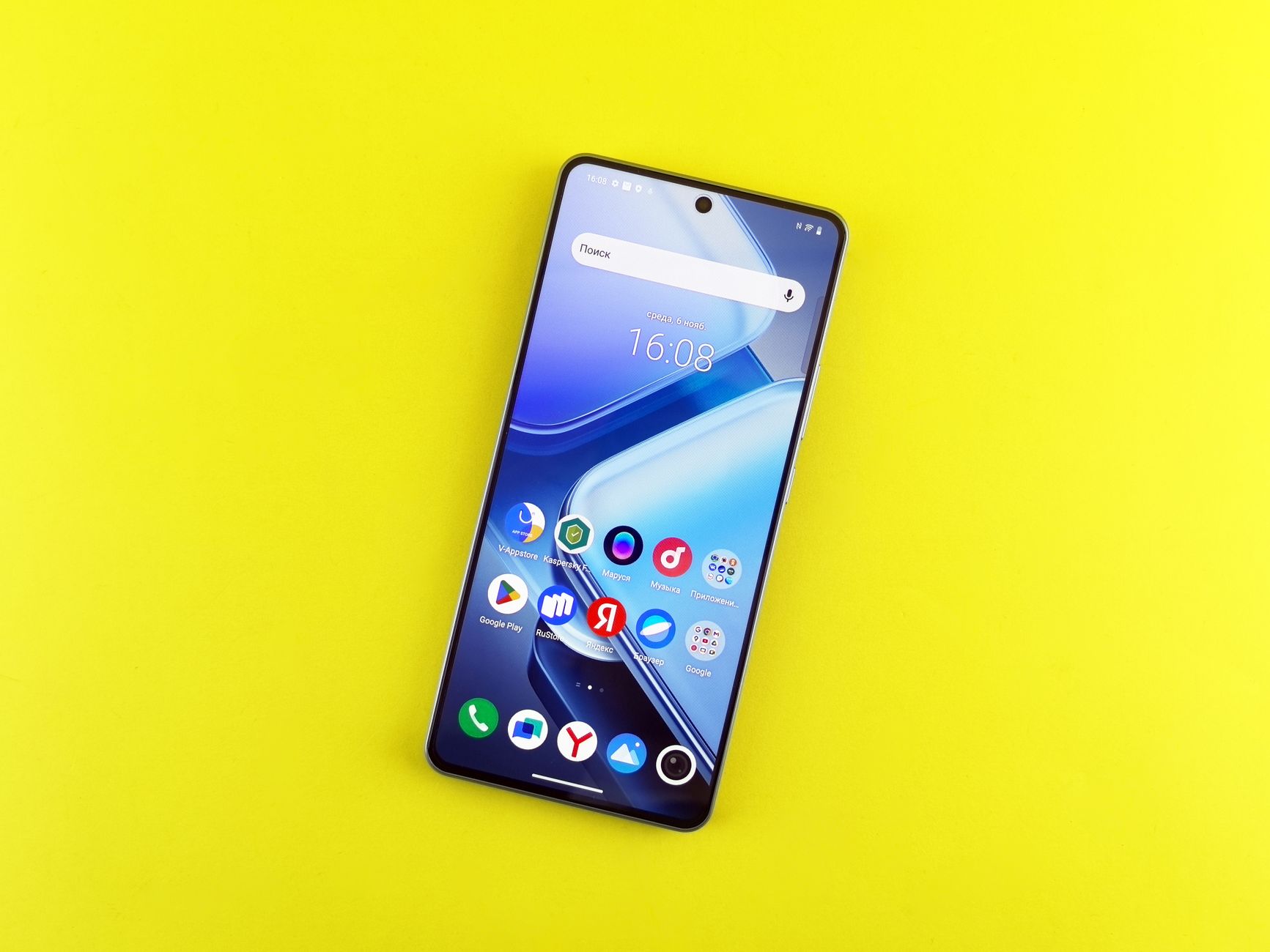 Modern smartphone with a blue screen displayed on a vibrant yellow background for a technology-focused look.