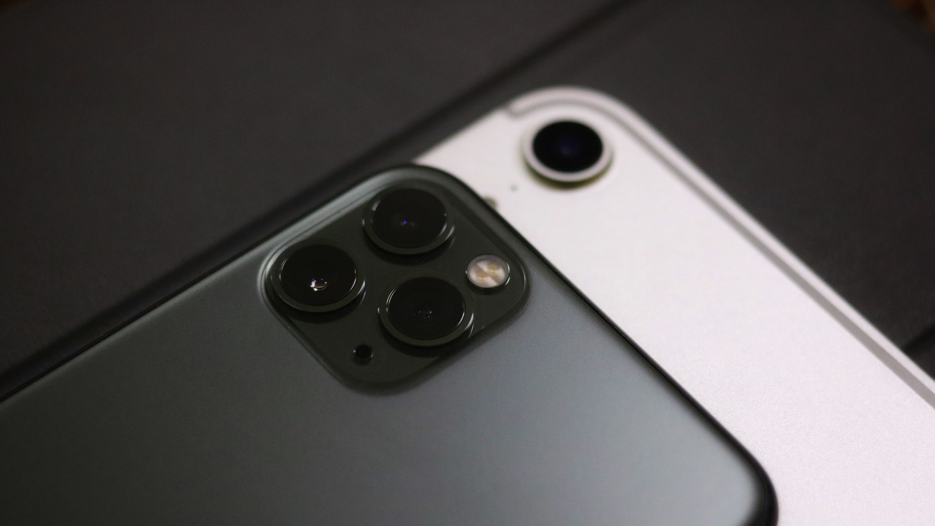 Detailed close-up of dual smartphone cameras showcasing advanced technology.